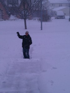 Monty shoveling snow in front of our Brookside home.